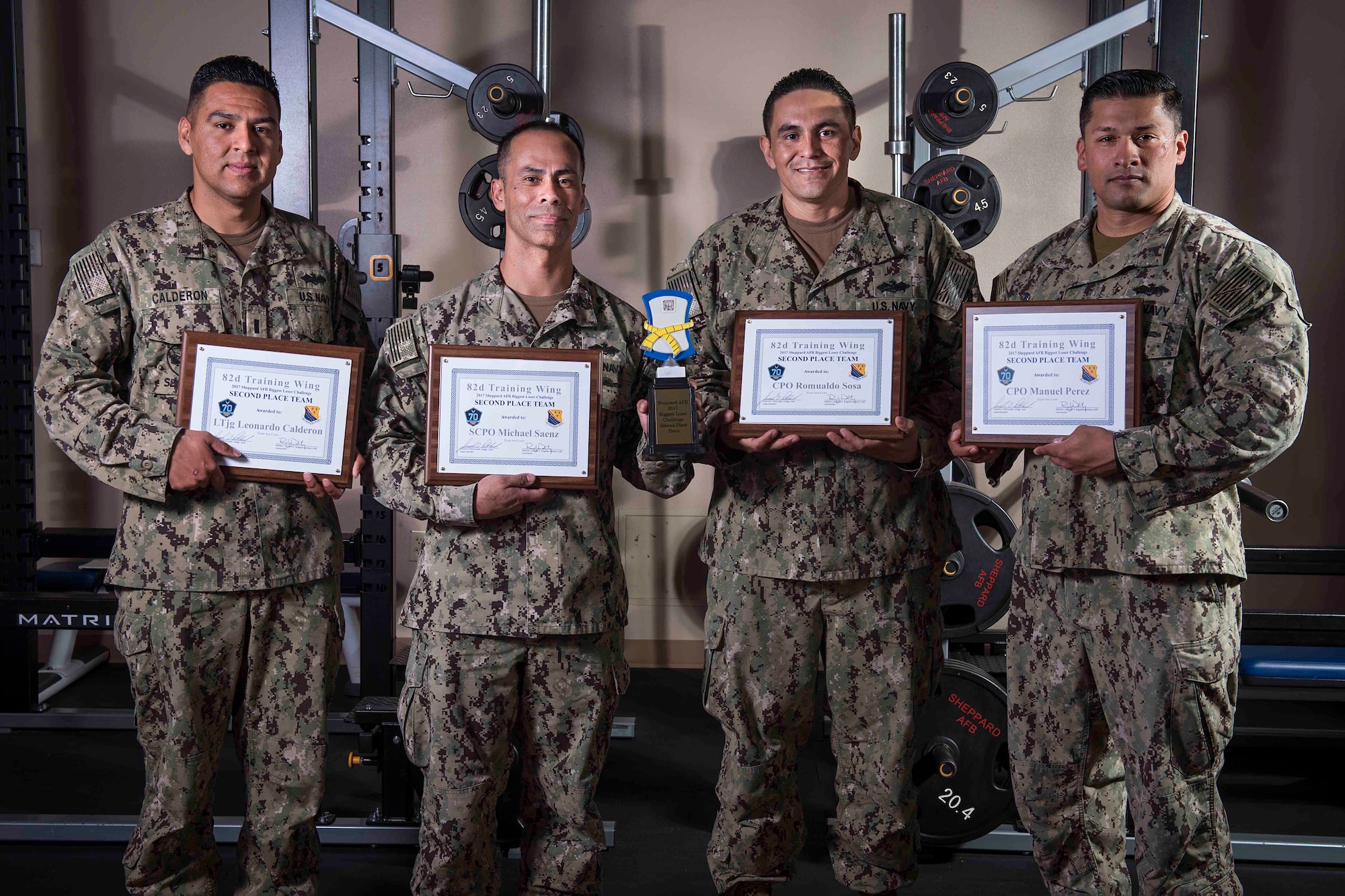 The U.S. Navy team ‘Sea Cows,’ was awarded second place in the Sheppard Air Force Base, Texas, Biggest Loser Challenge, March 9, 2017. This team is made up of U.S. Navy Lt. j.g. Leo Calderon, Senior Chief Petty Officer Michael Saenz, Chief Petty Officer Manuel Perez and Chief Petty Officer Romualdo Sosa. (U.S. Air Force photo by Staff Sgt. Kyle E. Gese)