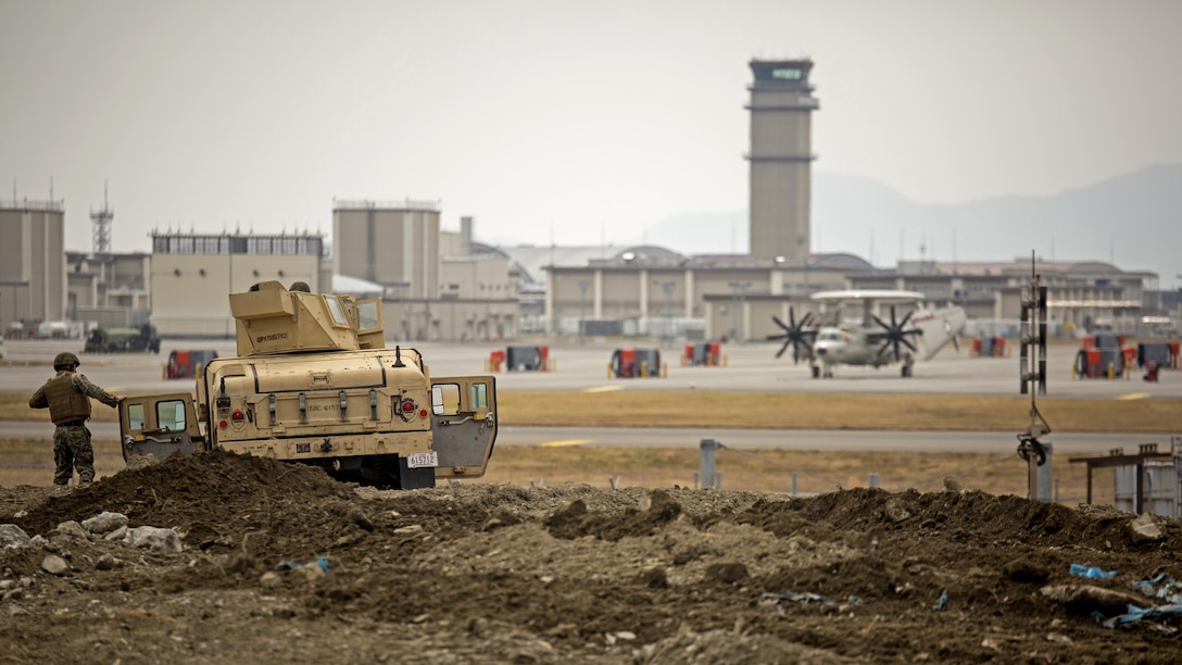 U.S. Marine Corps John M. Barraca, a motor transport operator with Marine Wing Support Squadron 171, participates in exercise Tanuki Wrath at Marine Corps Air Station Iwakuni, Japan, March 22, 2017. MWSS-171 conducted exercise Tanuki Wrath to help train Marines to set up security around a downed aircraft and how to control a riot.