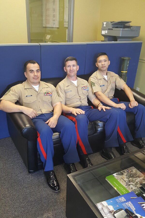 Gunnery Sergeant Luis Sanchez III (left), Col. Jeffrey C. Smitherman (center), and Sgt. James Carlo Eco (right) take a celebratory sit on Recruiting Substation (RSS) Savannah's new couch delivered Mar. 22, 2017. The couch and victory lunch was awarded to RSS Savannah in recognition for taking the lead in the "Happy Birthday Offensive" as the top RSS and also producing the top recruiter during the offensive. In order to take the lead, recruiting substations across 6th Marine Corps District (6th MCD) had to find people who desired to be a Marine while serving in the reserves. "I thought it was a great experience to have a one-on-one with the 6th Marine Corps District commanding officer," said Sanchez. "And to also have the opportunity to have my Marines being recognized for their hard work." Sanchez is the staff noncommissioned officer-in-charge of his recruiting substation. Smitherman is the commanding officer of 6th MCD. Eco is an extended active duty recruiter at RSS Savannah. (Courtesy photo)