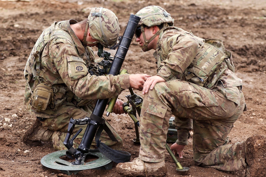 Army Spc. Jessie Patchell, left, and Pfc. Zachary Folsom set up an M224 mortar system during a mission supporting the Iraqi army's 9th Division near Tarab, Iraq, March 18, 2017. Patchell and Folsom are mortarmen assigned to the 82nd Airborne Division’s 2nd Brigade Combat Team, Combined Joint Task Force Operation Inherent Resolve. Army photo by Staff Sgt. Jason Hull