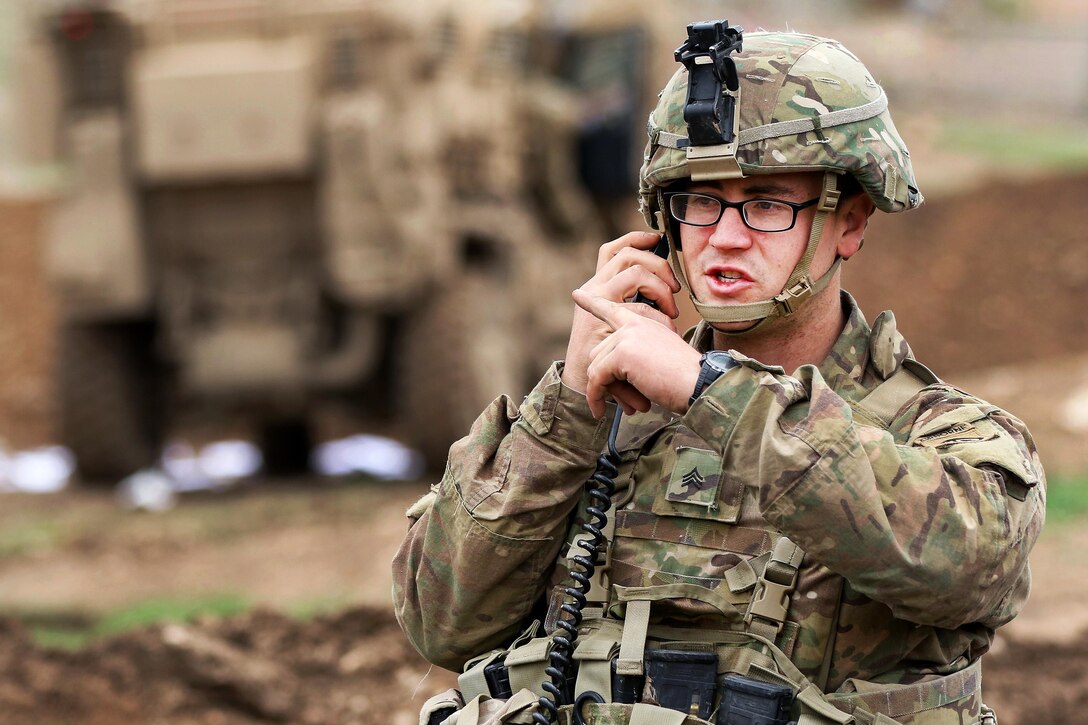 Army Sgt. Kraig Bradley checks mortar elevation data during a fire mission supporting the Iraqi army's 9th Division near Tarab, Iraq, March 18, 2017. Bradley is a mortarman assigned to the 82nd Airborne Division’s 2nd Brigade Combat Team, Combined Joint Task Force Operation Inherent Resolve. Army photo by Staff Sgt. Jason Hull