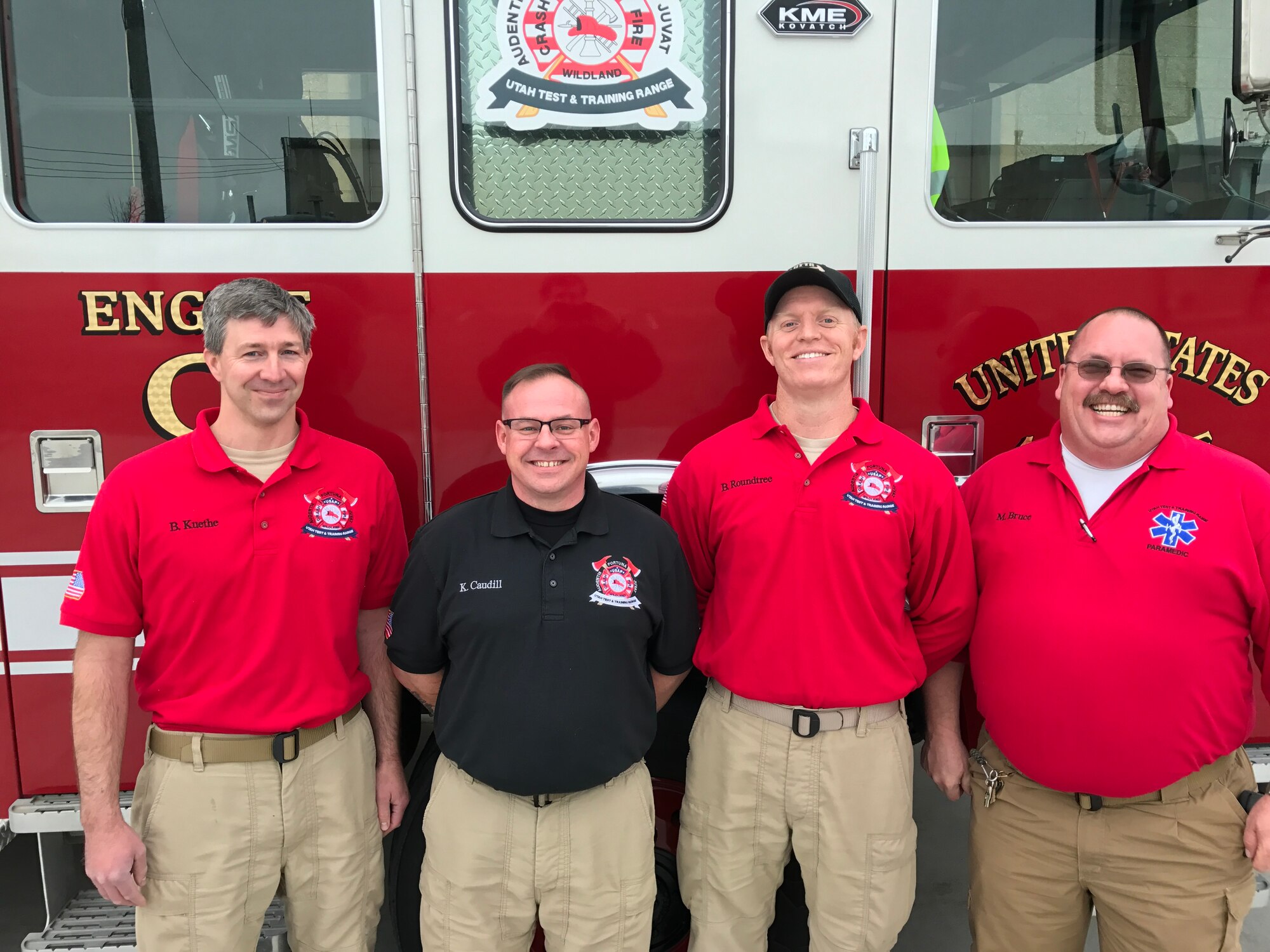 From the left, Capt. Benjamin Kuethe, Assistant Chief Kevin Caudill, Lt. Benjamin Roundtree and Paramedic Micheal Bruce pose for a photo at the Utah Test and Training Range, March 23. Ron D'Andrea was unavailable. (Courtesy photo)