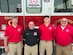 From the left, Capt. Benjamin Kuethe, Assistant Chief Kevin Caudill, Lt. Benjamin Roundtree and Paramedic Micheal Bruce pose for a photo at the Utah Test and Training Range, March 23. Ron D'Andrea was unavailable. (Courtesy photo)