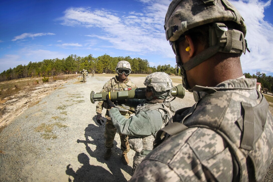A soldier scans her sector of fire before firing a M136 AT4 rocket launcher during a training exercise at Fort Bragg, N.C., March 17, 2017. The soldiers are assigned to the 82nd Airborne Division’s 122nd Aviation Support Battalion, 82nd Combat Aviation Brigade. Army photo by Capt. Adan Cazarez