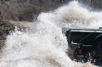 A 416th TEC Soldier fords a water obstacle during a portion of the offroad driving course at the Joliet Training Area, Elwood, Ill. The water fording offers trainees the ability to feel how the M1165 A1 HWMMV navigates all types of water obstacles, in a controlled environment (U.S. Army photo by Staff Sgt. Jason Proseus/released).