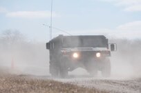 A 416th TEC Soldier goes through the brake test portion of the off-road driving course at the Joliet Training Area, Elwood, Ill. The brake test offers trainees the ability to feel how the M1165 A1 HWMMV comes to a sudden stop, in a controlled environment (U.S. Army photo by Staff Sgt. Jason Proseus/released).