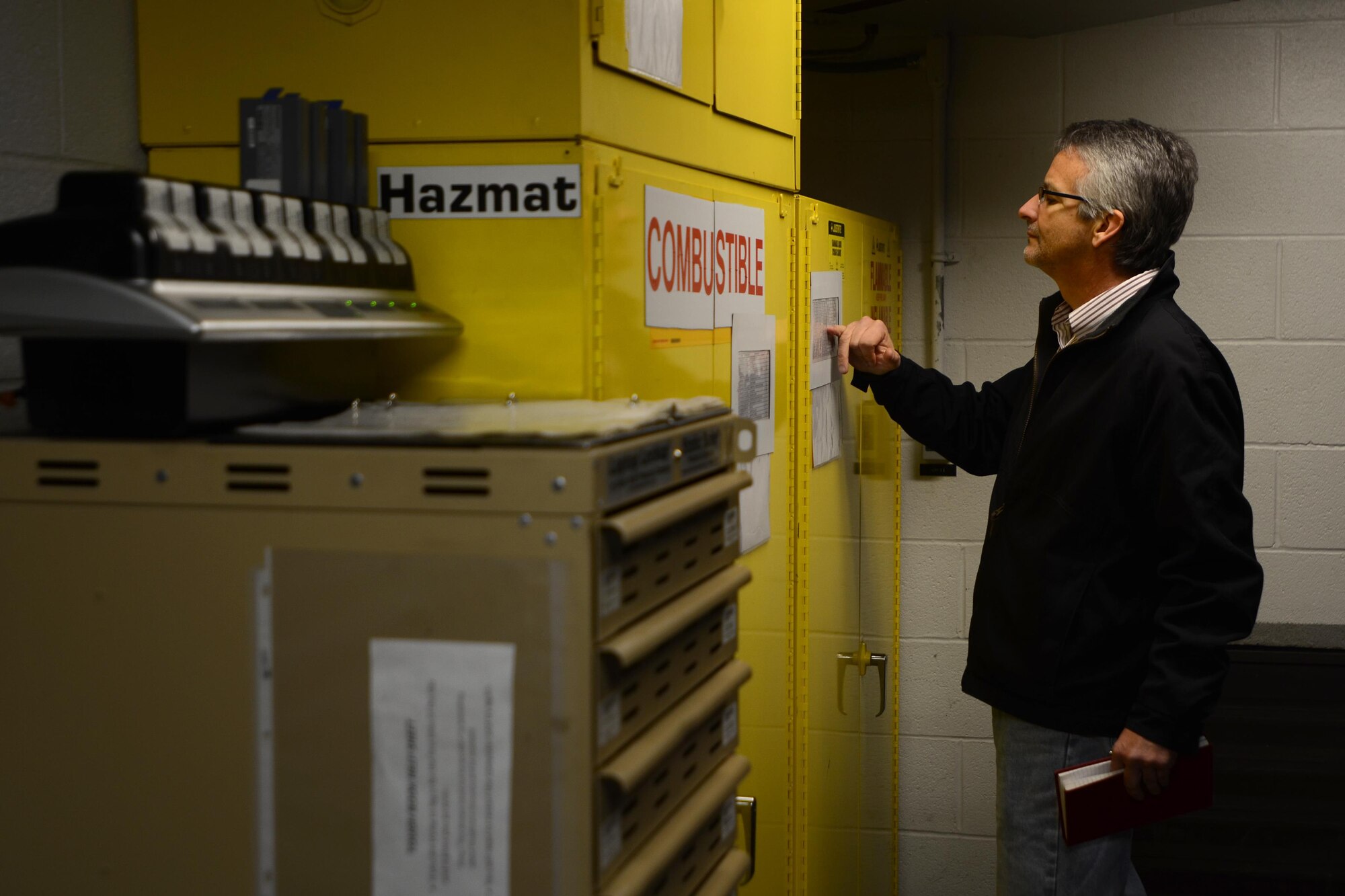 Mr. Luis Diaz, the environmental inspector from SAIC, inspects the 169th Maintenance Squadron’s Aerospace Ground Equipment facilities at McEntire Joint National Guard Base, S.C., during an Environmental, Safety and Occupational Health Compliance Assessment and Management Program (ESOHCAMP) inspection, Nov. 7, 2012. The ESOHCAMP inspection covers all aspects environmental, biological, and safety standards to ensure the base is in compliance with federal, state, local, DODI and AFI regulations.  (U.S. Air National Guard by Tech. Sgt. Caycee Watson)