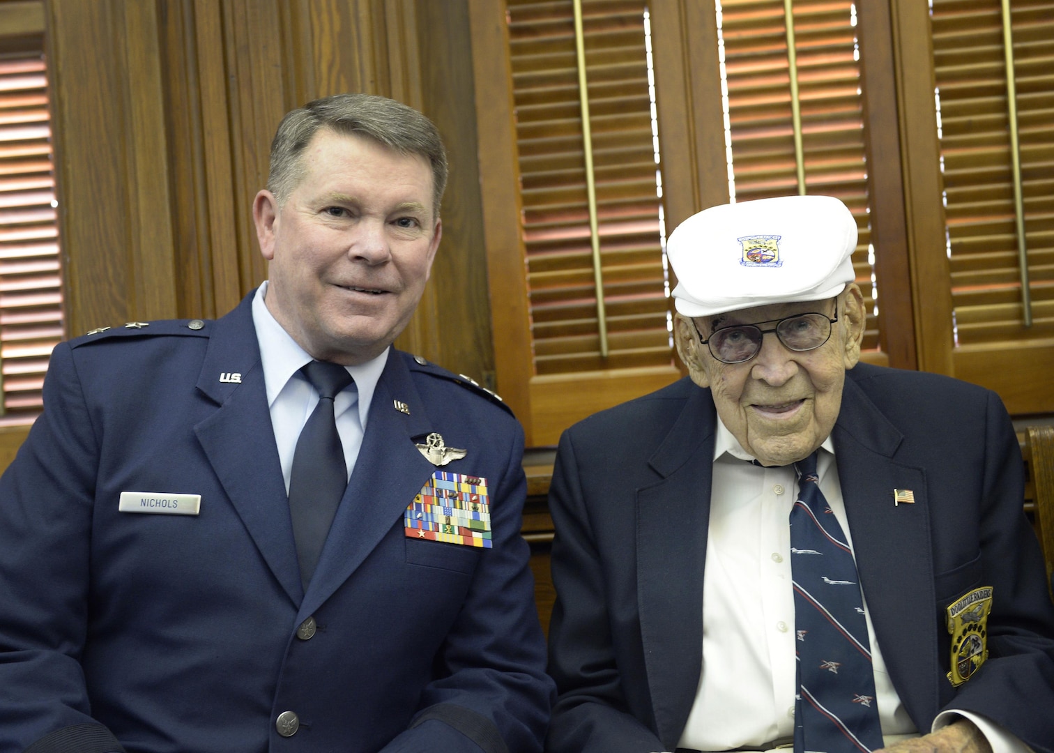 Maj. Gen. John F. Nichols, left, the adjutant general of Texas, sits with retired Lt. Col. Dick Cole prior to a Texas Senate event honoring the Doolittle Raiders of World War II, in Austin, Texas, March 6, 2017. Cole, 101, is the last surviving member of the Doolittle Raid. 