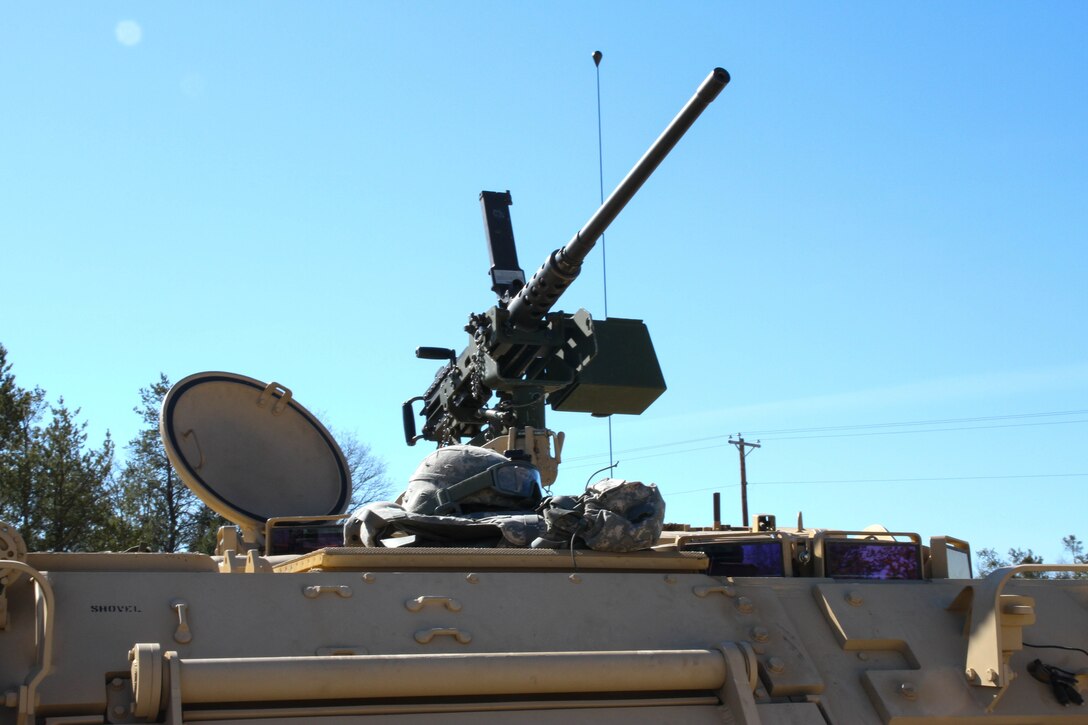 An Improved Outer Tactical Vest and Advanced Combat Helmet sit on an M113 Armored Personnel Carrier after it’s crew, from the 412th Theater Engineer Command, completed live-fire during Operation Cold Steel at Fort McCoy, Wis., March 22, 2017. Operation Cold Steel is the U.S. Army Reserve's crew-served weapons qualification and validation exercise to ensure that America's Army Reserve units and Soldiers are trained and ready to deploy on short-notice and bring combat-ready and lethal firepower in support of the Army and our joint partners anywhere in the world. (U.S. Army Reserve photo by Staff Sgt. Debralee Best, 84th Training Command)