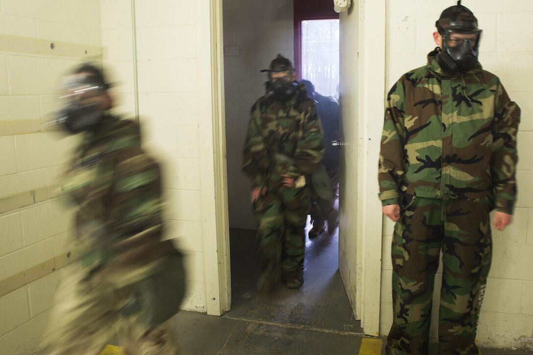 Marines enter a gas chamber at Camp Lejeune, N.C., March 14, 2017. 2nd Supply Battalion conducted gas chamber training to ensure that Marines are capable of defending themselves in case of a chemical, biological, radiological or nuclear attack. Marine Corps photo by Lance Cpl. Raul Torres