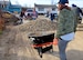 A team of women from Ellsworth Air Force Base landscape a Habitat for Humanity home during a build in Rapid City, S.D., March 18, 2017, as part of Women’s History Month. Nine women participated in the event to not only spread awareness for the month but to give back to the community. (U.S. Air Force photo by Airman 1st Class Donald C. Knechtel)