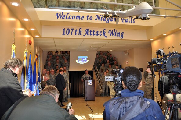 Members of the 107th Attack Wing along with invited guests and local media outlets gather for the official ceremony announcing the redesignation of the 107th from an airlift wing to an attack wing, March 21, 2017 at the Niagara Falls Air Reserve Station N.Y.  The 107 ATKW, NY Air National Guard, is the largest tenant organization on NFARS. The host unit of the base, the 914th Airlift Wing of the Air Force Reserve will be receiving its own redesignation in June as it converts from an airlift wing to an air refueling wing.  (U.S. Air Force photo by Master Sgt. Kevin Nichols)