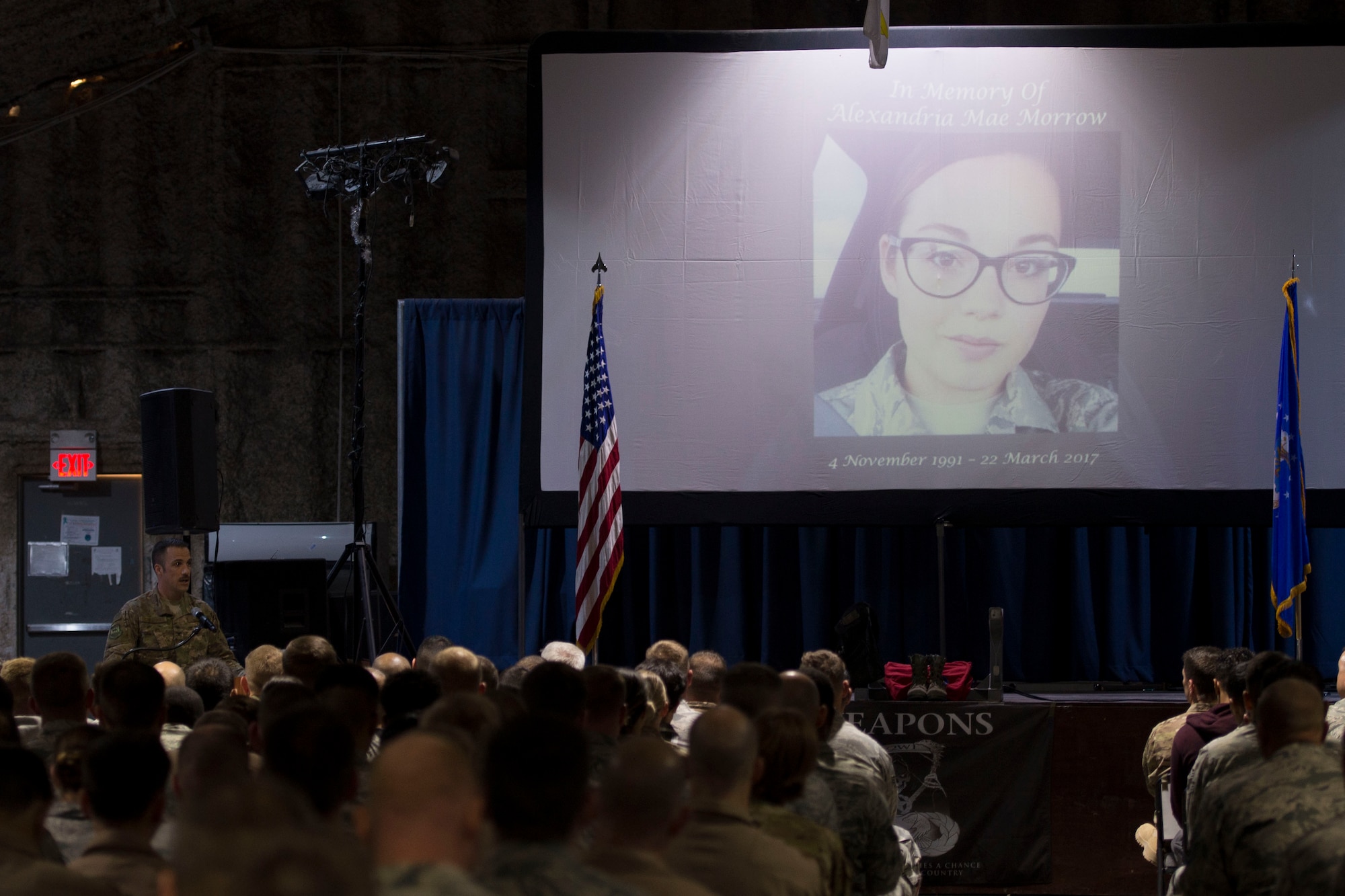 Col. Clinton Eichelberger, 332nd Air Expeditionary Wing commander, speaks during a fallen warrior memorial ceremony Mar. 23, 2017, in Southwest Asia. The commander updated the Airmen on the status of Staff Sgt. Alexandria Morrow, 332nd Expeditionary Maintenance Squadron weapons load crew member, who died from injuries sustained while performing work duties in support of Operation Inherent Resolve. (U.S. Air Force photo by Staff Sgt. Eboni Reams)
