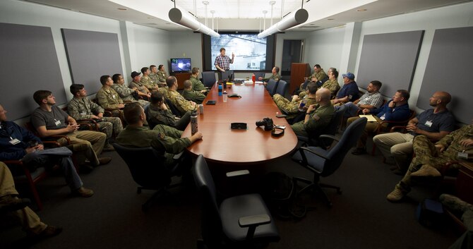 Air Commandos attend an orientation briefing at the McKinley Climatic Laboratory at Eglin Air Force Base, Fla., March 20, 2017. The AC-130J Ghostrider gunship went to the climatic lab to test its competence to function at 0-degree temperatures. (U.S. Air Force photo by Airman 1st Class Dennis Spain)