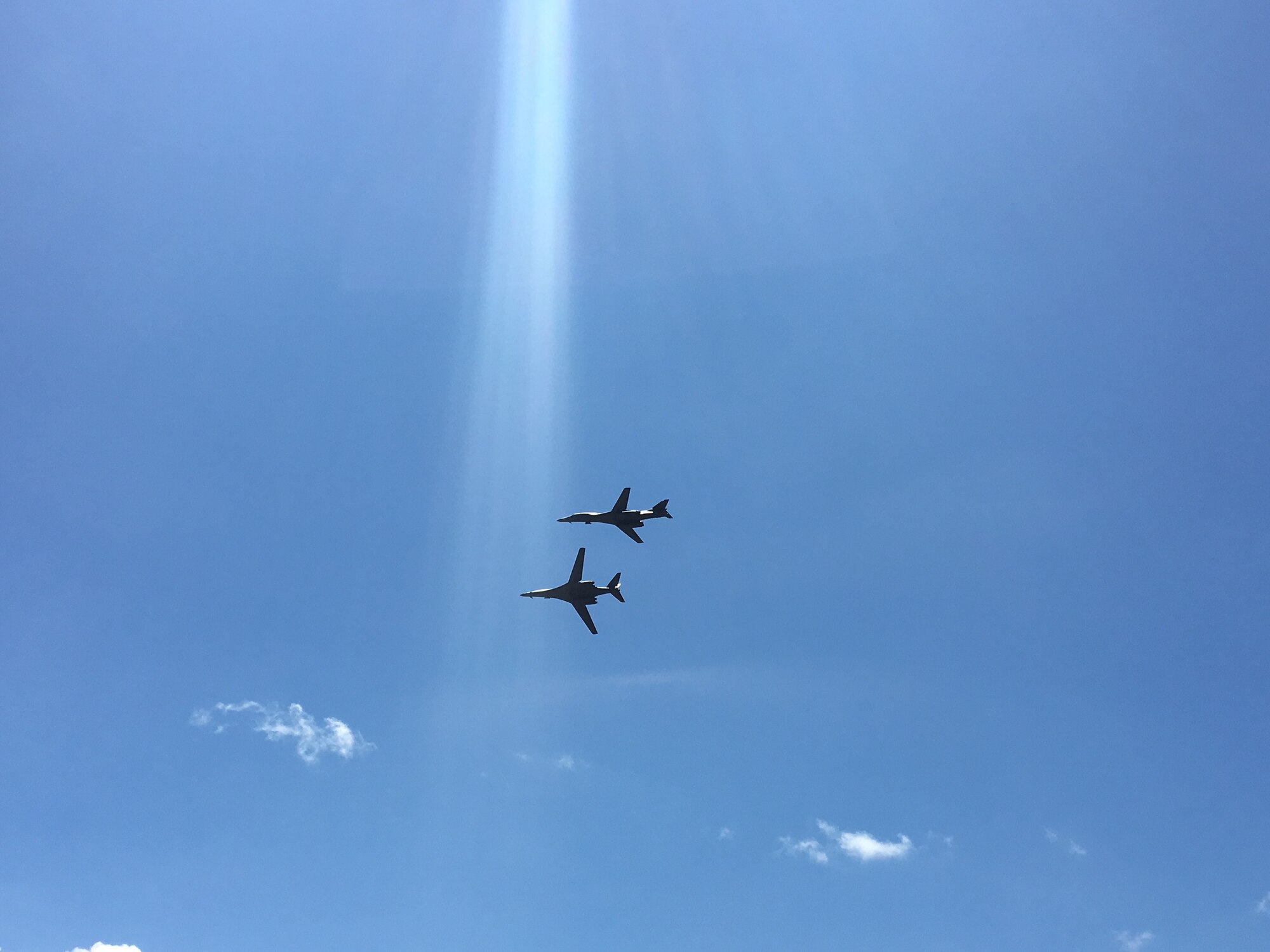 Two U.S. Air Force B-1B Lancer bomber aircraft with the 7th Bomb Wing, 9th Expeditionary Bomb Squadron from Dyess Air Force Base, Texas, currently deployed to Andersen Air Force Base in Guam, conduct a flyover during Langkawi International Maritime and Aerospace Exhibition (LIMA) 2017, Langkawi Island, Malaysia, March 21, 2017. LIMA is the premier aerospace and maritime exhibition in Malaysia. The biennial event helps grow military-to-military relationship between participants. The B-1 is a highly versatile, multi-mission weapon system that can rapidly deliver massive quantities of precision and non-precision weapons against any adversary. The B-1 is a key component to improving both joint service and ally interoperability. The rotation of this aircraft supports U.S. Pacific Command’s Continuous Bomber Presence, and is specifically designed to demonstrate the commitment of the U.S. to the Indo-Asia-Pacific region and regional security. (U.S. Air Force photo by Capt. Jessica Clark)