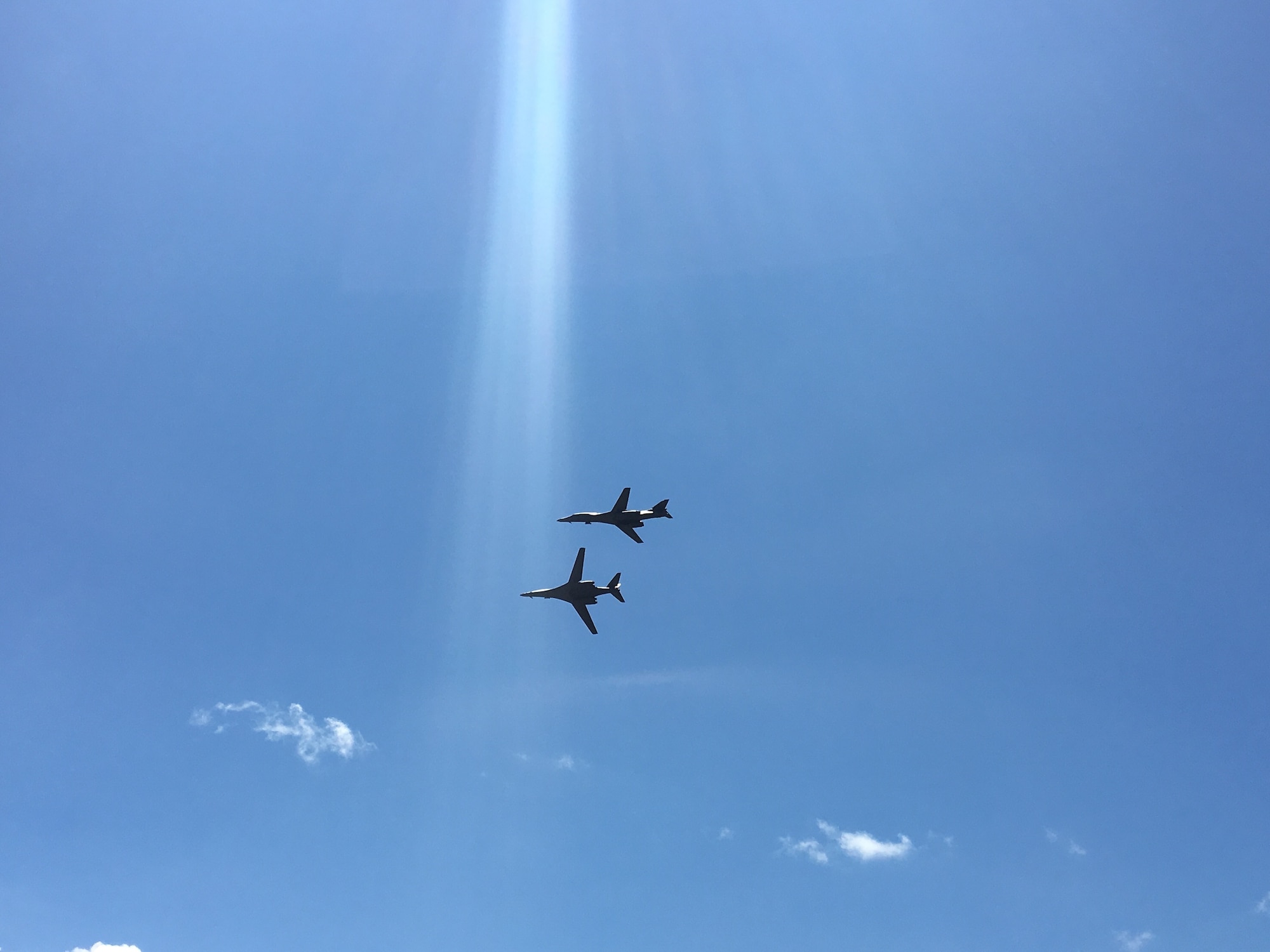 Two U.S. Air Force B-1B Lancer bomber aircraft with the 7th Bomb Wing, 9th Expeditionary Bomb Squadron from Dyess Air Force Base, Texas, currently deployed to Andersen Air Force Base in Guam, conduct a flyover during Langkawi International Maritime and Aerospace Exhibition (LIMA) 2017, Langkawi Island, Malaysia, March 21, 2017. LIMA is the premier aerospace and maritime exhibition in Malaysia. The biennial event helps grow military-to-military relationship between participants. The B-1 is a highly versatile, multi-mission weapon system that can rapidly deliver massive quantities of precision and non-precision weapons against any adversary. The B-1 is a key component to improving both joint service and ally interoperability. The rotation of this aircraft supports U.S. Pacific Command’s Continuous Bomber Presence, and is specifically designed to demonstrate the commitment of the U.S. to the Indo-Asia-Pacific region and regional security. (U.S. Air Force photo by Capt. Jessica Clark)