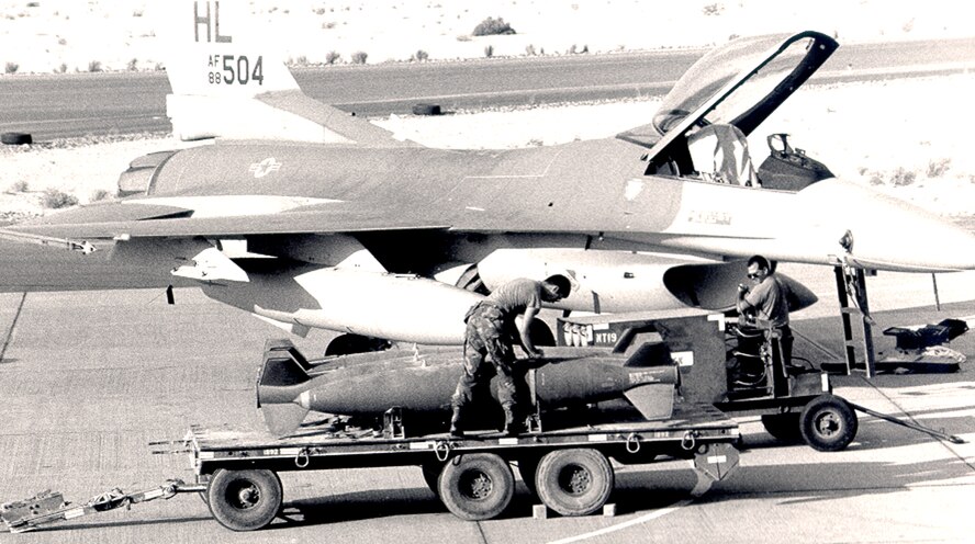 An F-16 aircraft from the 4th Tactical Fighter Squadron being armed during Operation Desert Storm. (Courtesy photo)