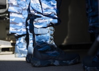 A member of the Indonesian Air Force stands inside a RPA Ground Control Station during a distinguished visitor tour at Holloman Air Force Base, N.M. on March 15, 2017. The IDAF delegation visited the base to learn about MQ-9 operations and Holloman’s RPA mission. (U.S. Air Force photo by Airman 1st Class Alexis P. Docherty)