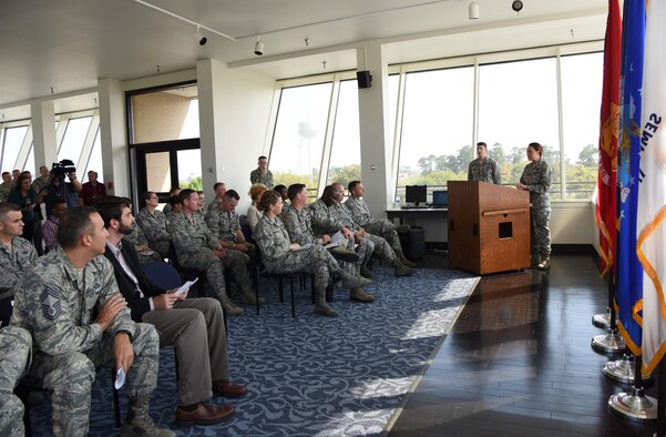 Lt. Col. Elizabeth Aptekar, 335th Training Squadron commander, delivers remarks during the unveiling of a Science on a Sphere at the Weather Training Complex March 23, 2017, on Keesler Air Force Base, Miss. This latest training aid displays planetary data onto a suspended carbon-fiber sphere helping instructors enhance student’s understanding of the atmosphere. (U.S. Air Force photo by Kemberly Groue)