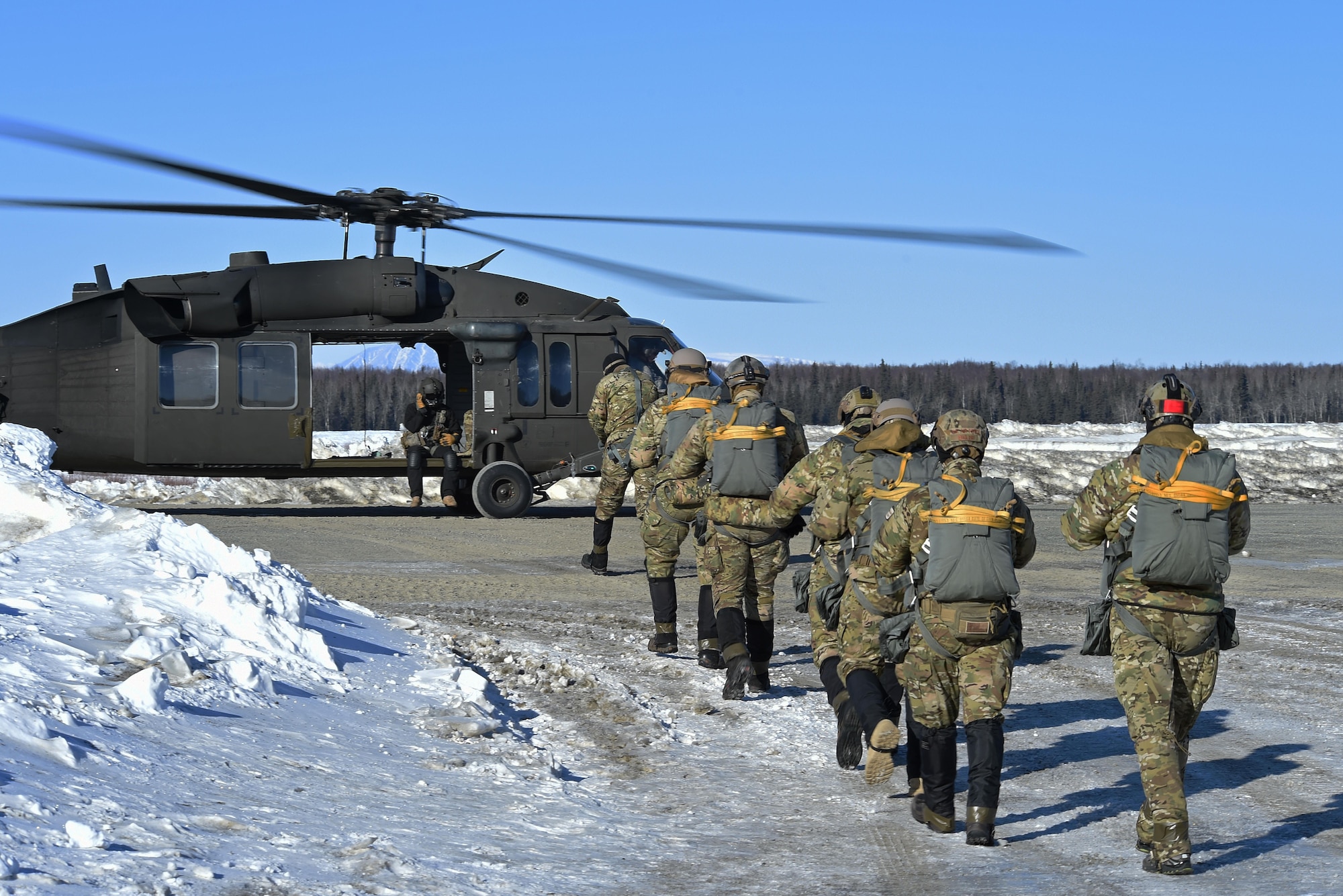 Tactical air control party Airmen with the 3rd Air Support Operations Squadron conduct jump training out of UH-60 Black Hawks at the Malemute Drop Zone at Joint Base Elmendorf-Richardson, Alaska, March 22, 2017.  Routine jump training is conducted to maintain proficiency and train for prospective missions. 