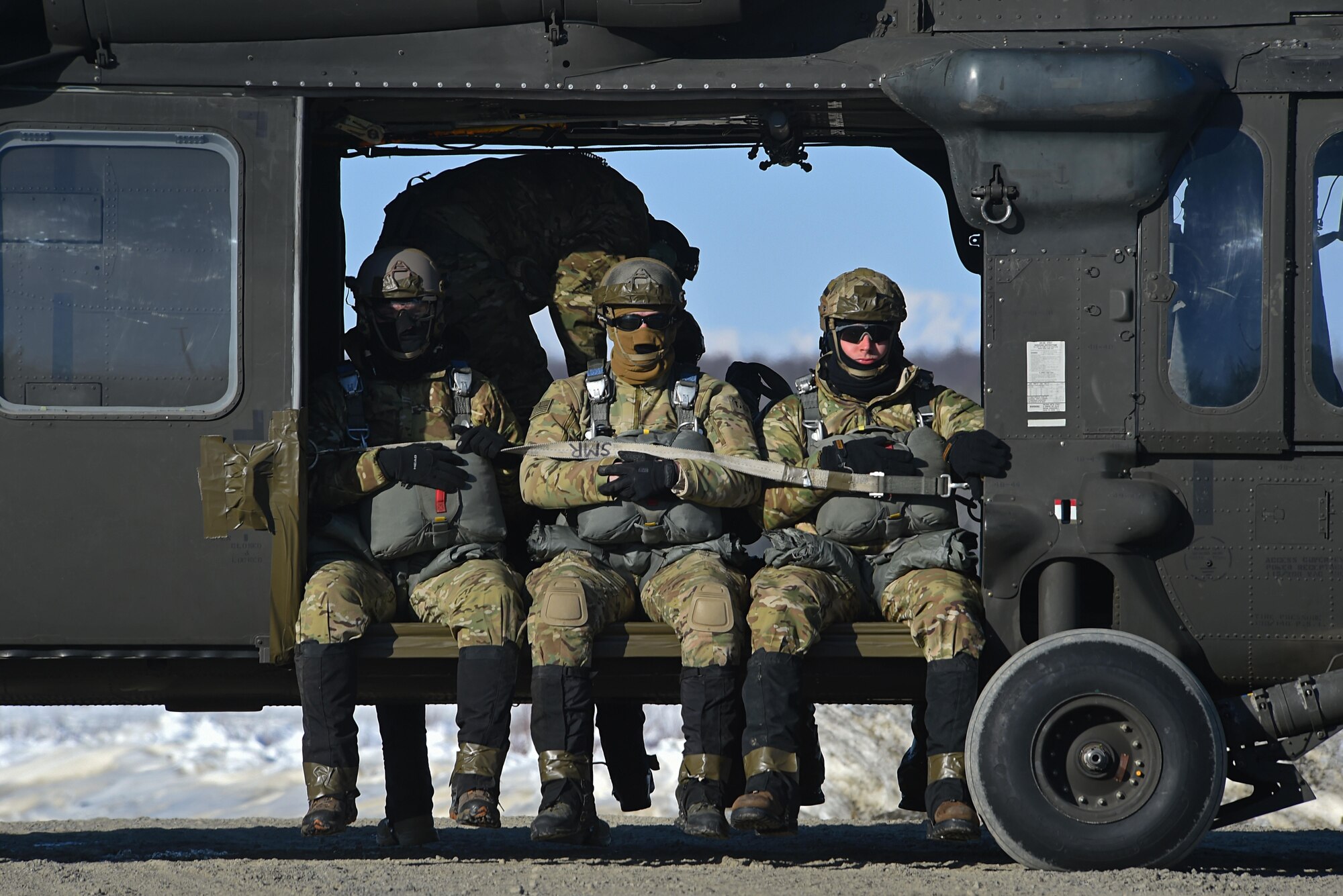 Tactical air control party Airmen with the 3rd Air Support Operations Squadron conduct jump training out of UH-60 Black Hawks at the Malemute Drop Zone at Joint Base Elmendorf-Richardson, Alaska, March 22, 2017.  Routine jump training is conducted to maintain proficiency and train for prospective missions. 
