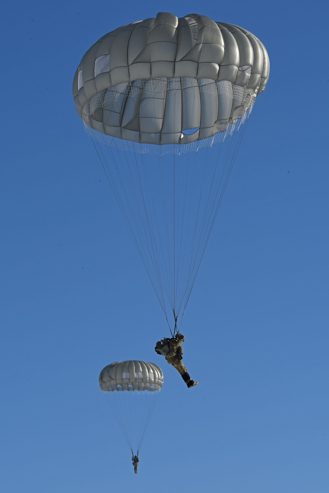 Tactical air control party Airmen with the 3rd Air Support Operations Squadron and paratroopers with the 4th Quartermaster Company, 725th Brigade Support Battalion (Airborne), 4th Infantry Brigade Combat Team (Airborne), 25th Infantry Division, U.S. Army Alaska,  conduct jump training out of UH-60 Black Hawks at the Malemute Drop Zone at Joint Base Elmendorf-Richardson, Alaska, March 22, 2017. Routine jump training is conducted to maintain proficiency and train for prospective missions. 