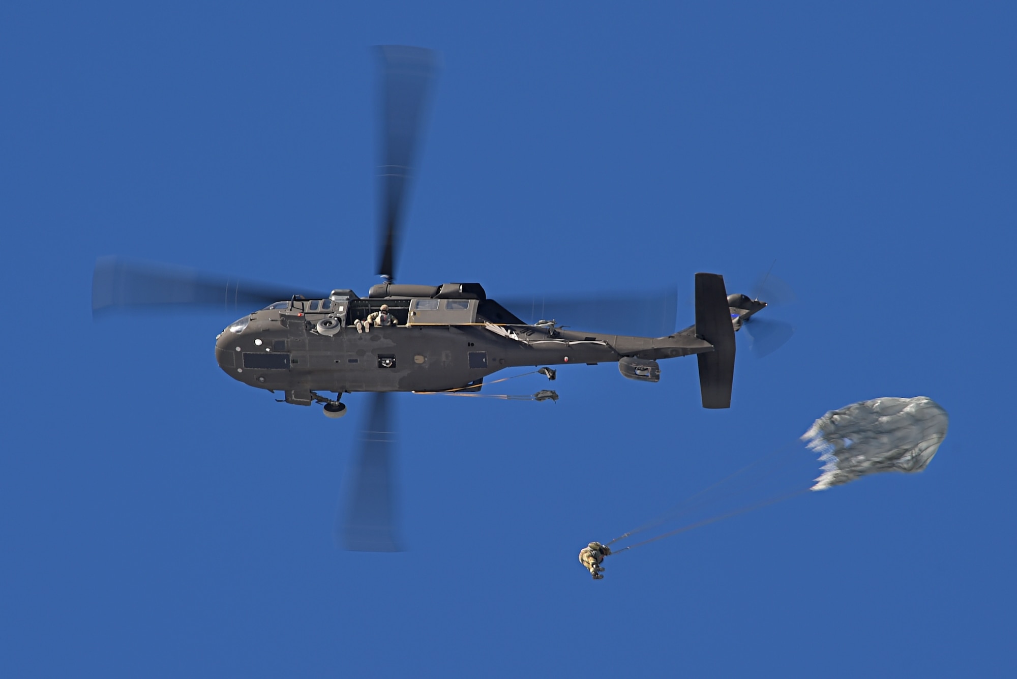 Tactical air control party Airmen with the 3rd Air Support Operations Squadron and paratroopers with the 4th Quartermaster Company, 725th Brigade Support Battalion (Airborne), 4th Infantry Brigade Combat Team (Airborne), 25th Infantry Division, U.S. Army Alaska,  conduct jump training at the Malemute Drop Zone at Joint Base Elmendorf-Richardson, Alaska, March 22, 2017. Routine jump training is conducted to maintain proficiency and train for prospective missions. 