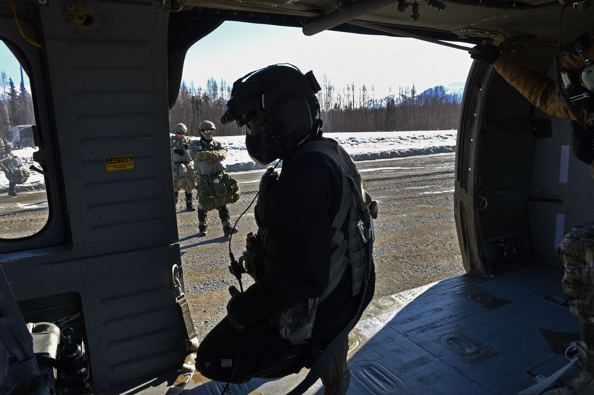 Tactical air control party Airmen with the 3rd Air Support Operations Squadron, load onto a UH-60 Black Hawk during jump training at the Malemute Drop Zone at Joint Base Elmendorf-Richardson, Alaska, March 22, 2017. Routine jump training is conducted to maintain proficiency and train for prospective missions. 