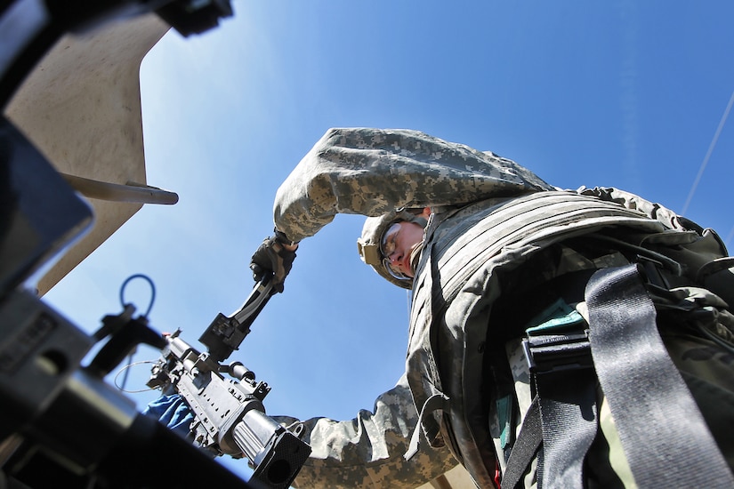 Army Reserve Spc. Caleb Johnson, 441st Transportation Company, New Orleans, Louisiana, conducts pre-combat checks on his vehicle-mounted M240 Bravo ahead of moving onto a blank fire range during the Operation Cold Steel exercise conducted at Fort McCoy, Wisconsin, Mar. 22, 2017. Operation Cold Steel is the U.S. Army Reserve’s first large-scale live-fire training and crew-served weapons qualification and validation exercise taking place from March 9 through April 25, 2017. Cold Steel is key to ensuring that America’s Army Reserve units and Soldiers are trained and ready to deploy on short-notice and bring combat-ready and lethal firepower in support of the Total Army and Joint Force partners around the world. In support of the Total Army Force, First Army Master Gunners participated in Cold Steel to provide expertise in crew level gunnery qualifications, and to develop Vehicle Crew Evaluator training, preparing units here and when they return to their home stations to conduct crew served weapons training and vehicle crew gunnery at the unit-level. 475 crews with an estimated 1,600 Army Reserve Soldiers will certify in M2, M19 and M240 Bravo crew served weapons mounted to various military vehicle platforms such as Humvees, Family of Medium Tactical Vehicles, Heavy Expanded Mobility Tactical Trucks, and Heavy Equipment Transport Systems across 12-day rotations (15 crews per cycle) through the seven-week exercise.
(U.S. Army Reserve photo by Master Sgt. Anthony L. Taylor)