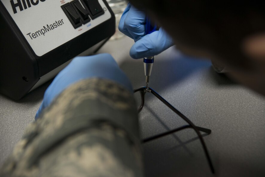 U.S. Air Force Tech. Sgt. Christopher Hutchinson, a 35th Aerospace Medicine Squadron optometry technician, repairs a pair of glasses at Misawa Air Base, Japan, March 10, 2017. In conjunction with fixing glasses on a walk in bases, the clinic also orders more than 250 pairs of glasses a month. Two doctors and three technicians at Misawa optometry clinic ensure Airmen are mission ready with minimal delay. (U.S. Air Force photo by Staff Sgt. Melanie A. Hutto)