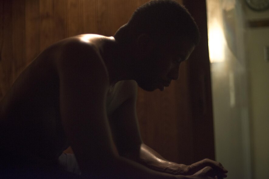 Staff Sgt. Dustin Payne, 374th Airlift Wing public affairs broadcast craftsman, sits in the Samurai Fitness Center's sauna room at Yokota Air Base, Japan, Mar. 13, 2017.  To be eligible to compete in his amateur kickboxing debut, Payne lost nearly 40 lbs. through running, sauna sessions and dieting. (U.S. Air Force photo by Senior Airman David C. Danford)