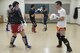 Staff Sgt. Dustin Payne, 374th Airlift Wing public affairs broadcast craftsman, spars with professional Japanese kickboxers in preparation for his amateur debut at a gym in the Hachioji ward of Tokyo, Japan, Mar. 14, 2017. Payne's kickboxing instructors invited athletes from different gyms around Tokyo to give him experience with different styles. (U.S. Air Force photo by Senior Airman David C. Danford)
