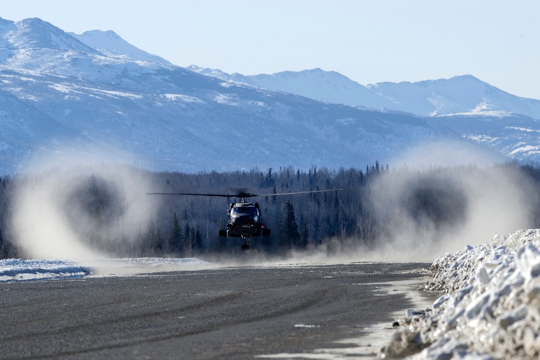 A UH-60 Black Hawk helicopter lands at Malemute drop zone, Joint Base Elmendorf-Richardson, Alaska, March 22, 2017. The helicopter crew is assigned to the Alaska Army National Guard’s 1st Battalion, 207th Aviation Regiment. Air Force photo by Alejandro Pena