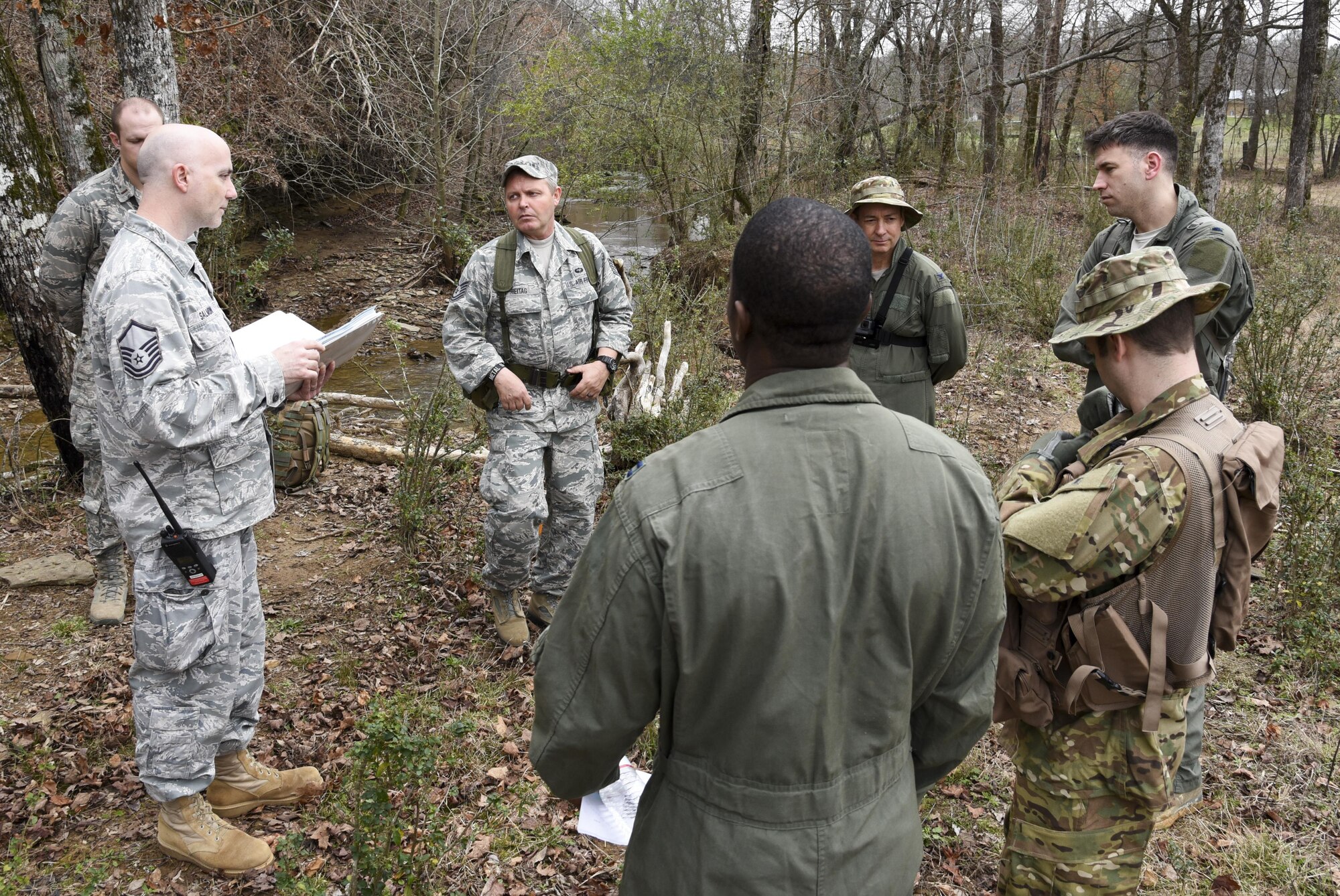 Airmen from the 117th Air Refueling Wing conduct survival training in Hanceville, Ala., Feb. 12, 2017.  The survival course instructed Airmen how to navigate unknown terrain in order to find a safe landing zone to be extracted by helicopter.  The training is mandatory every three years to maintain mission readiness.  (U.S. Air National Guard photo by Staff Sgt. Jeremy Farson)