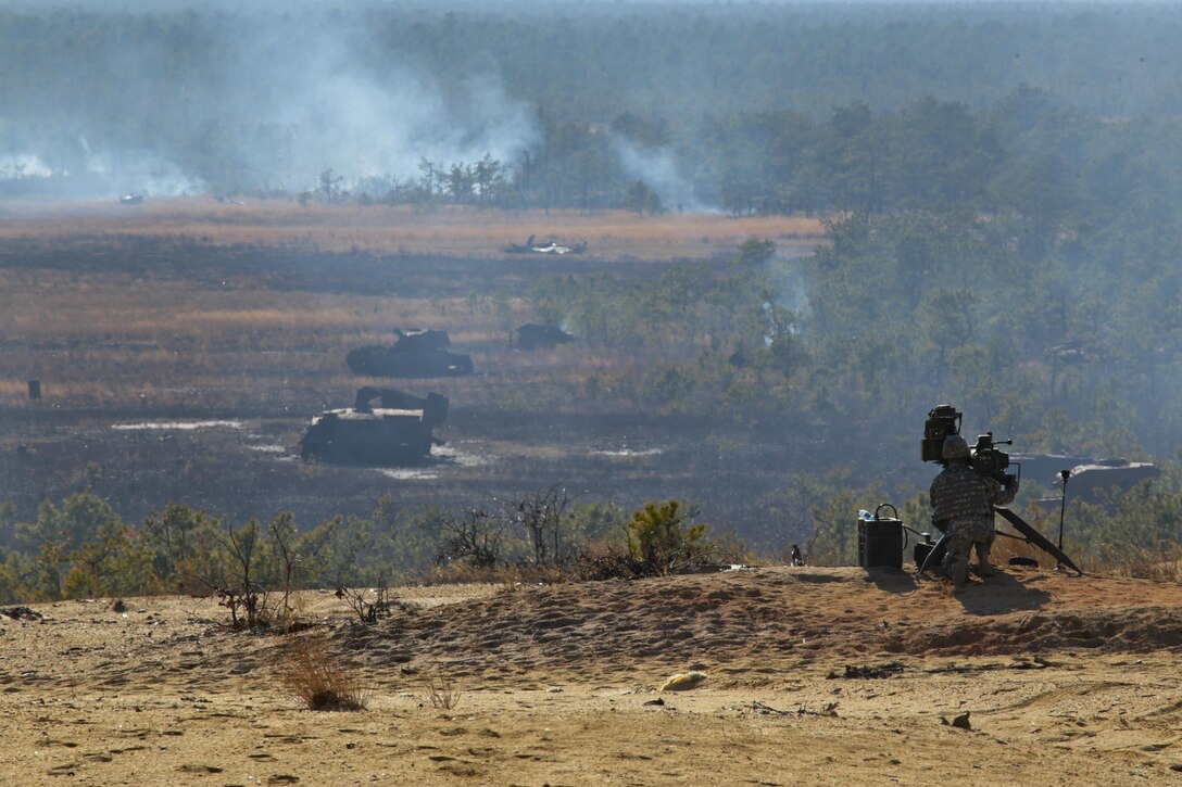 Army Pvt. Calvin Kaczenski takes aim with a tripod-mounted BGM-71 anti-tank missile launcher during training at Joint Base McGuire-Dix-Lakehurst, N.J., March 23, 2017. Air National Guard photo by Master Sgt. Matt Hecht