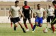 U.S. Air Force Airmen with the 379th Expeditionary Security Forces Squadron play soccer with Qatar Emiri Air Force Security Forces members at Al Udeid Air Base, Qatar, March 23, 2017. The Airmen participated in a friendly game of soccer held to give members a chance to interact with their host nation partners. (U.S. Air Force photo by Senior Airman Cynthia A. Innocenti)