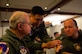 Lt. Col. Kenji Takado, a Pentagon flight medicine clinic flight surgeon, assists attendees during a battlefield acupuncture class on Ramstein Air Base, Germany, March 21, 2017. Battlefield acupuncture emerged in the early 2000s as a way to give quick pain relief treatment to troops in combat environments, and has since made its way into non-combat applications. (U.S. Air Force photo by Airman 1st Class Joshua Magbanua)