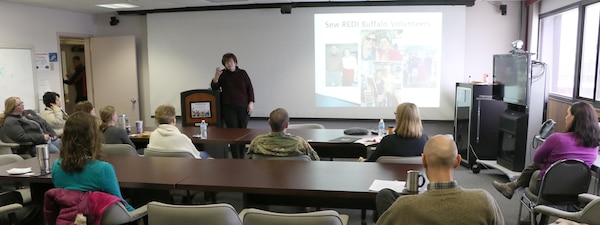 Dr. Patricia Hutton, founder of the Sew Refugee Economic Development Initiative (REDI) address USACE Buffalo District staff during Women’s History Month. 