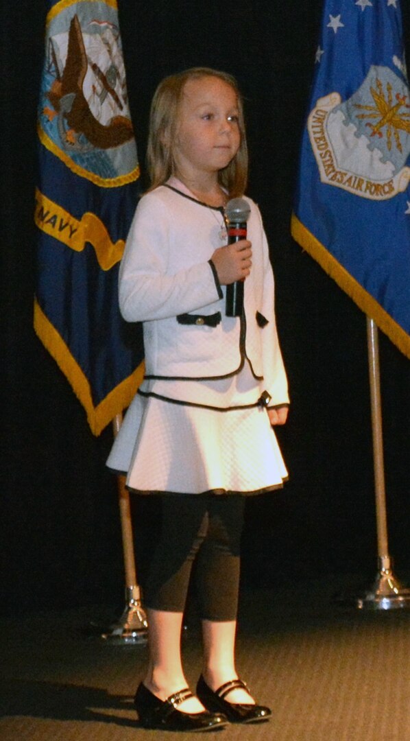 Six-year-old Ella Lambert wows the audience by telling them she was going to be the first female president of the United States during the Joint Base San Antonio-Fort Sam Houston Women’s History Month commemoration at the Fort Sam Houston Theater March 21.