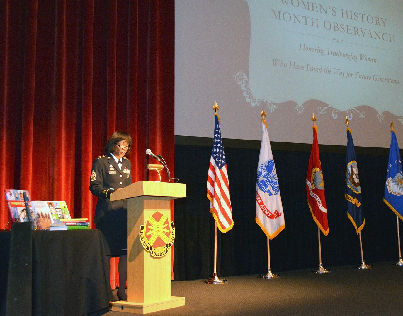 Command Sgt. Maj. Tabitha Gavia, Regional Health Command-Central command sergeant major, speaks during the Joint Base San Antonio-Fort Sam Houston Women’s History Month commemoration at the historic Fort Sam Houston Theater March 21. Gavia was the guest speaker for the event.