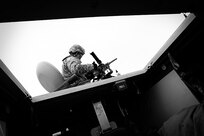 Army Reserve Staff Sgt. Jason Kelly, Combat Engineer, 366th Engineer Company, Canton New York, conducts pre-checks on his M2 .50 Caliber Machine Gun before a gunnery crew live-fire qualification in a M113 Armored Personnel Carrier at the Operation Cold Steel exercise in Fort McCoy, Wisconsin, Mar. 23, 2017. Operation Cold Steel is the U.S. Army Reserve’s first large-scale live-fire training and crew-served weapons qualification and validation exercise taking place from March 9 through April 25, 2017. Cold Steel is key to ensuring that America’s Army Reserve units and Soldiers are trained and ready to deploy on short-notice and bring combat-ready and lethal firepower in support of the Total Army and Joint Force partners around the world. In support of the Total Army Force, First Army Master Gunners participated in Cold Steel to provide expertise in crew level gunnery qualifications, and to develop Vehicle Crew Evaluator training, preparing units here and when they return to their home stations to conduct crew served weapons training and vehicle crew gunnery at the unit-level. 475 crews with an estimated 1,600 Army Reserve Soldiers will certify in M2, M19 and M240 Bravo crew served weapons mounted to various military vehicle platforms such as Humvees, Family of Medium Tactical Vehicles, Heavy Expanded Mobility Tactical Trucks, and Heavy Equipment Transport Systems across 12-day rotations (15 crews per cycle) through the seven-week exercise.
(U.S. Army Reserve photo by Master Sgt. Anthony L. Taylor)