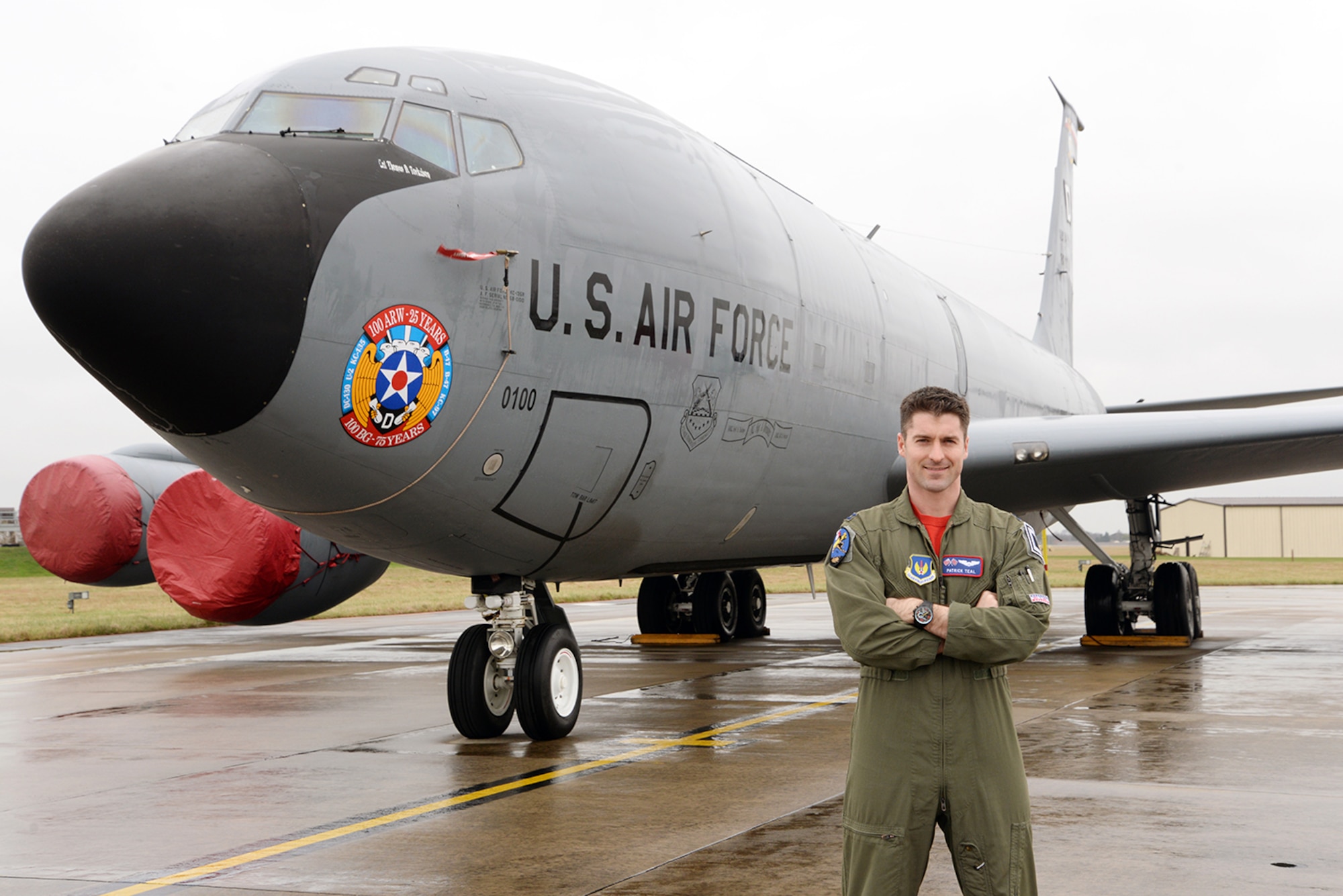U.S. Air Force Capt. Patrick Teal, 351st Air Refueling Squadron pilot and aircraft commander poses for a photo in front of a 100th Air Refueling Wing KC-135 Stratotanker, March 3, 2017, on RAF Mildenhall, England. This is the wing’s lead jet and is the only RAF Mildenhall aircraft to display the 100th ARW’s 25th Anniversary logo as nose art. Teal’s father, a former navigator in the U.S. Air Force, was also stationed at RAF Mildenhall and arrived Feb. 1, 1993, exactly one year after the activation of the 100th ARW. (U.S. Air Force photo by Karen Abeyasekere)