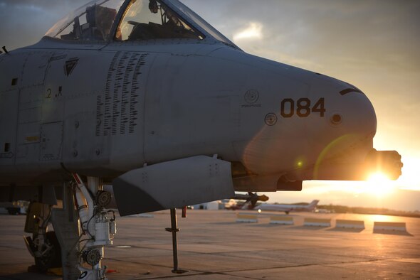Several A-10 Thunderbolt II aircraft wait for a sunset take off during night training at Gowen Field, Boise, Idaho on March 20, 2017. (U.S. Air National Guard photo/ Master Sgt. Becky Vanshur)