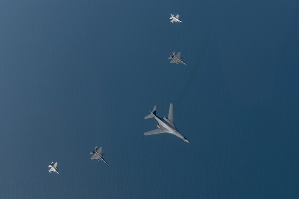 A U.S. Air Force B-1B Lancer flies in formation with South Korean air force F-15Ks and F-16s in the vicinity of South Korea March 21, 2017. The sortie was carried out as part of U.S. Pacific Command's continuous bomber presence mission.