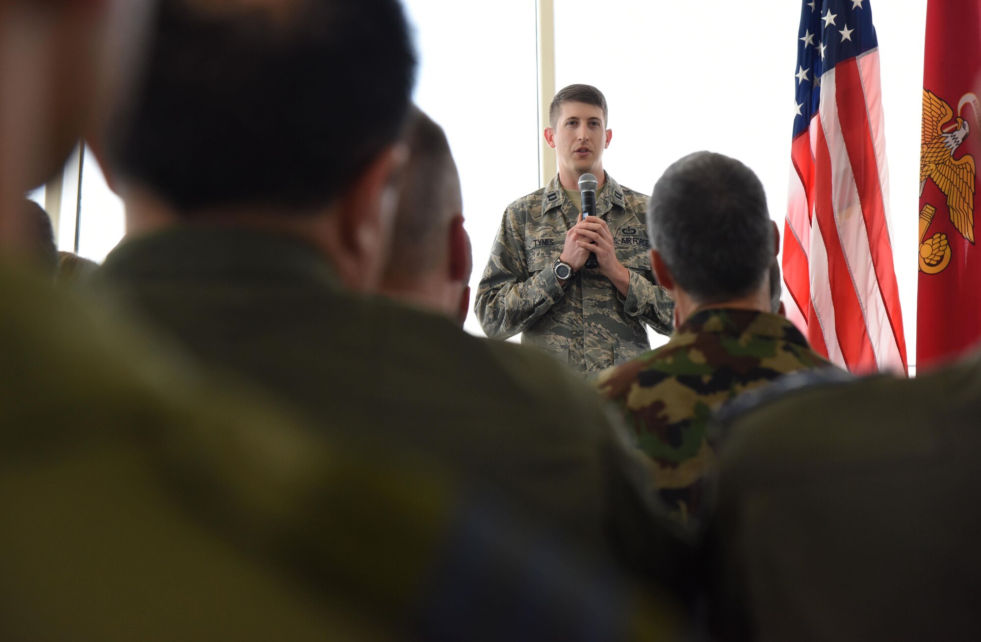 Capt. Caleb Tynes, 335th Training Squadron instructor, provides a weather training course briefing during an Air Attaché visit at the weather training facility March 20, 2017, on Keesler Air Force Base, Miss. The visit provided diplomatically accredited attachés with an overview of industrial, cultural and social aspects of the U.S. military and develop cordial relations amongst international attachés. (U.S. Air Force photo by Kemberly Groue)