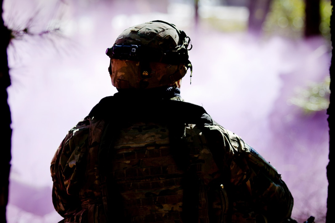 A soldier prepares to engage the enemy under the cover of smoke during a hasty raid training exercise, part of Warrior Exercise 78-17-01 at Joint Base McGuire-Dix Lakehurst, N.J. March 16, 2017. Army Reserve Photo by Master Sgt. Mark Bell
