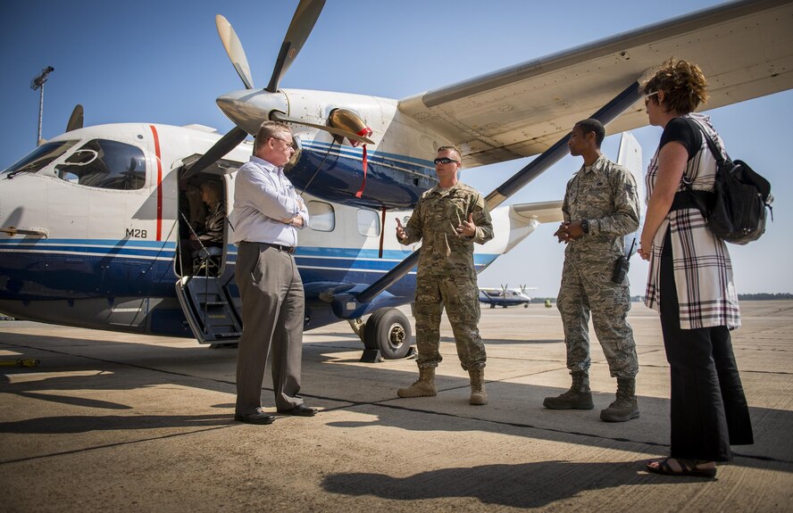 Staff Sgt. Chris Ishler, 592nd Aircraft Maintenance Squadron, talks to Crestview Military Affairs Committee members about the C-145A Skytruck during their tour of Duke Field, Fla., March 23.  (U.S. Air Force photo/Tech. Sgt. Samuel King Jr.)