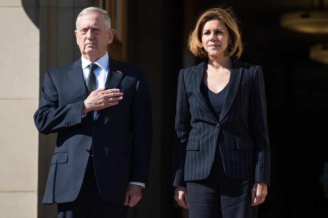 Defense Secretary Jim Mattis stands with Spanish Defense Minister María Dolores de Cospedal while welcoming her to the Pentagon for a meeting, March 23, 2017. DoD photo by Army Sgt. Amber I. Smith