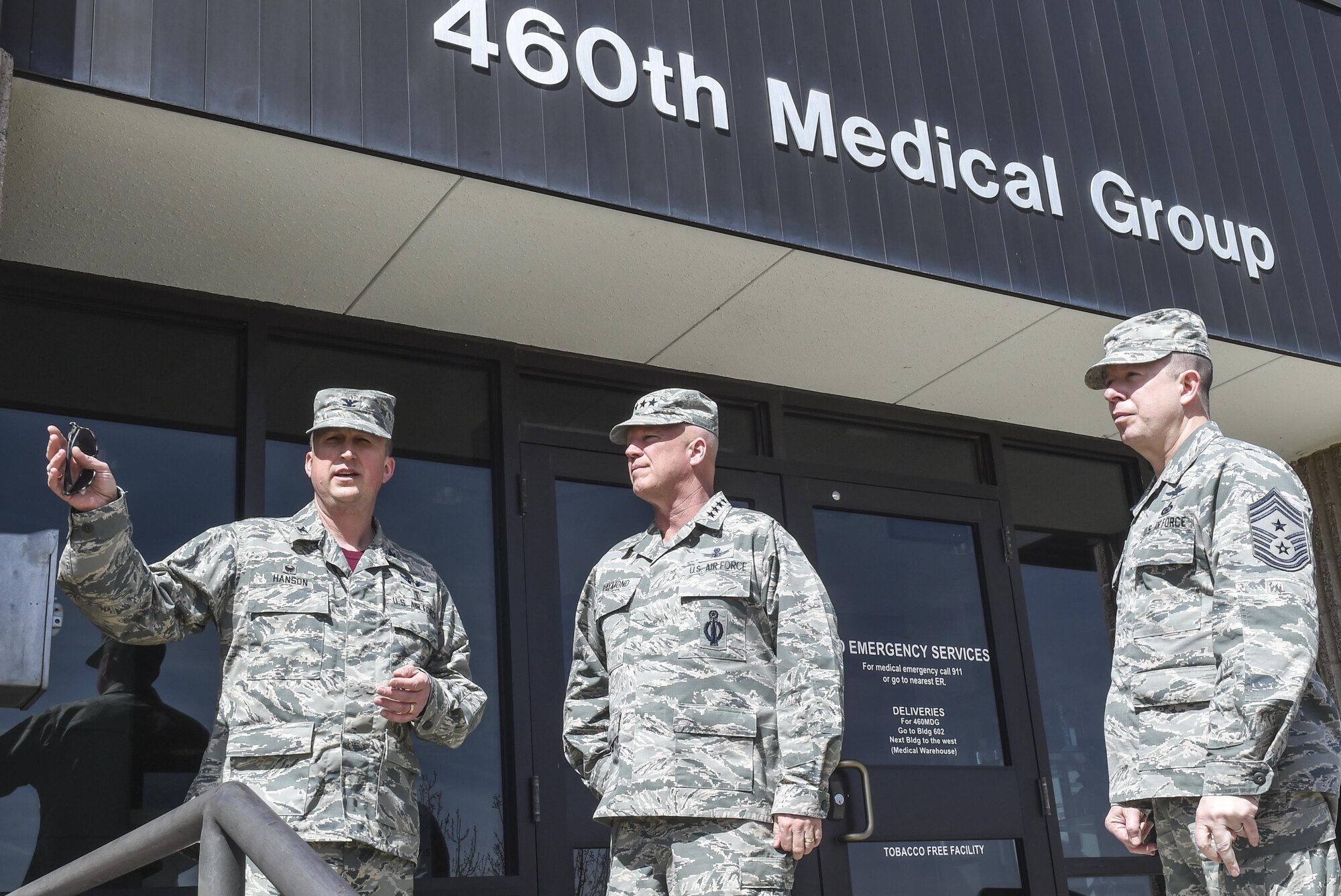 Col. Matthew Hanson, 460th Medical Group commander, left, talks about the changes coming to the 460th MDG with Gen. Jay Raymond, commander of Air Force Space Command, center, and Chief Master Sgt. Brendan Criswell, AFSPC command chief, March 17, 2017, at Buckley Air Force Base, Colo. Buckley boasts America’s Premier Space Wing, installation support to 95 multiservice and multinational units, a population of over 94,000 Team Buckley members, and a mission that is critical to the nation’s safety. (U.S. Air Force photo by Tech. Sgt. Nicholas Rau) 