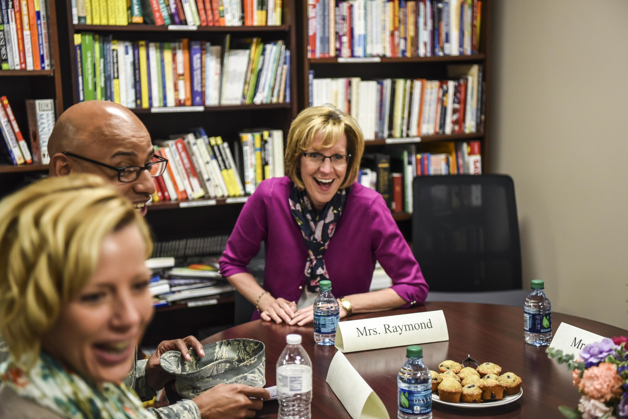 Mrs. Mollie Raymond, the general’s wife and quality of life champion, gets excited about the coming improvements to Airmen lives during a discussion with senior leaders focused on the wing’s priority of Airmen and Families March 17, 2017, at Buckley Air Force Base, Colo. The 460th Space Wing created new strategic guidance to ensure the successful accomplishment and stewardship of the mission, people, and base. (U.S. Air Force photo by Airman Holden Faul)